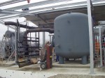 Cold water pressure maintenance with surge tank